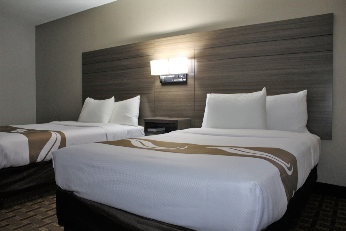 Hotel room with two double beds